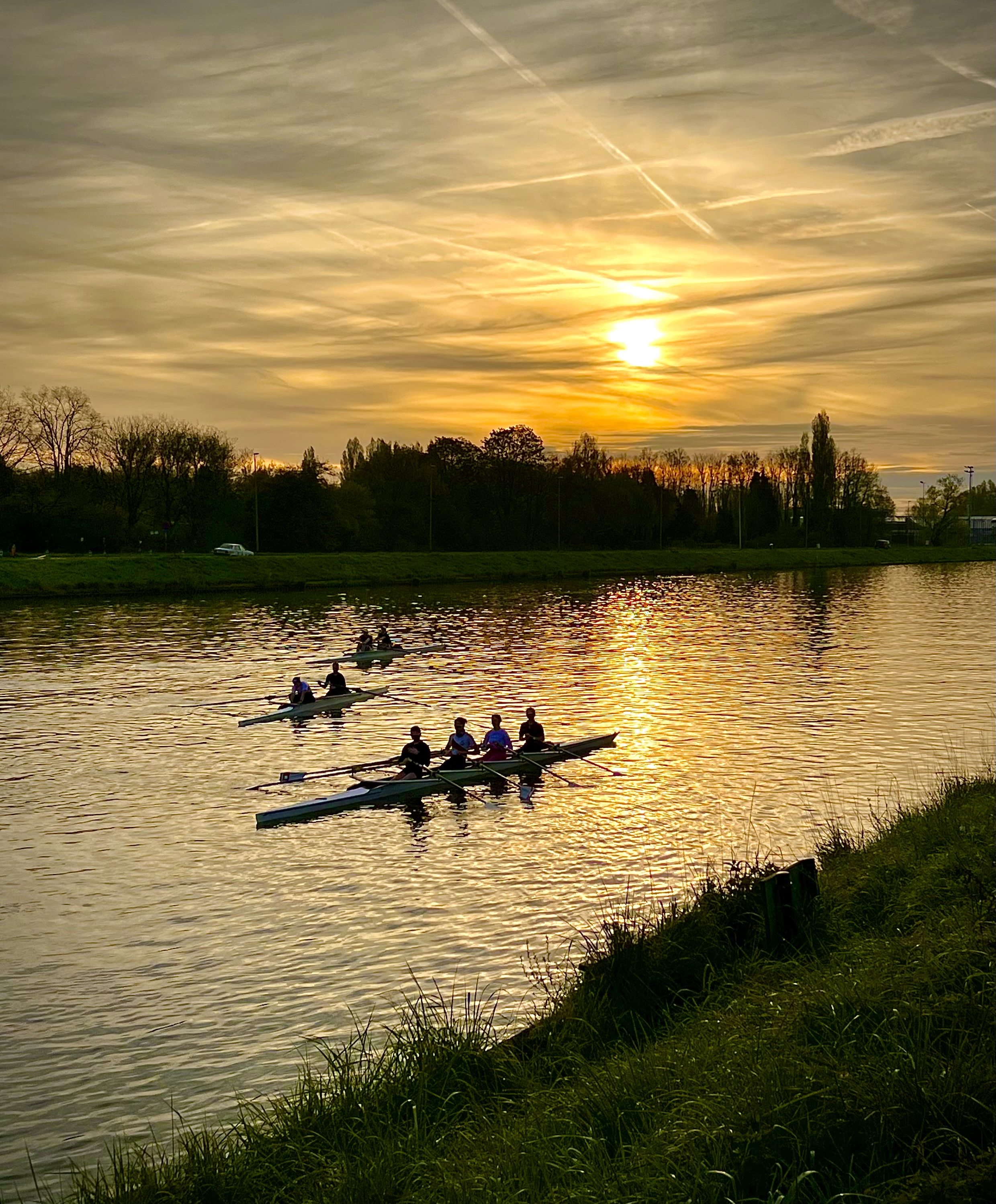 College Boat Club students rowing in canals of  Ghent, Belgium for their annual Easter training camp and Ghent International Spring Regatta.